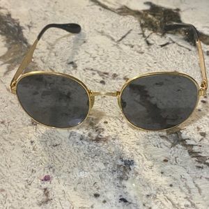 Gold Ray Ban sunglasses